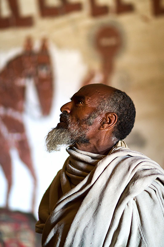 87   Priest of the Yohannes Maequdi rock hewn church   Ethiopia 